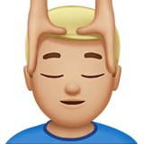 man getting massage: medium-light skin tone Apple Emoji