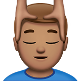man getting massage: medium skin tone Apple Emoji