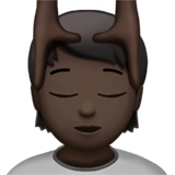 person getting massage: dark skin tone Apple Emoji