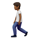 person walking: medium-dark skin tone Apple Emoji