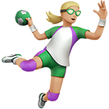 woman playing handball: medium-light skin tone Apple Emoji
